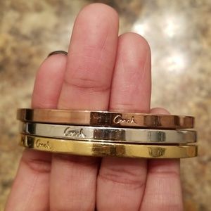 3 Coach bracelets